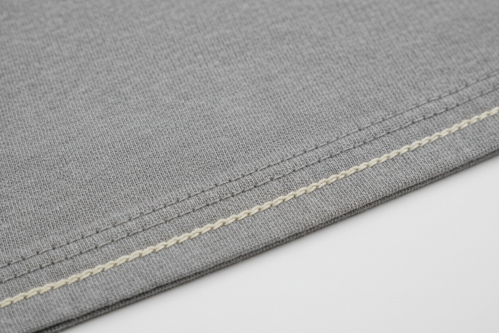 Detalhe Premium - Tecido e Costuras